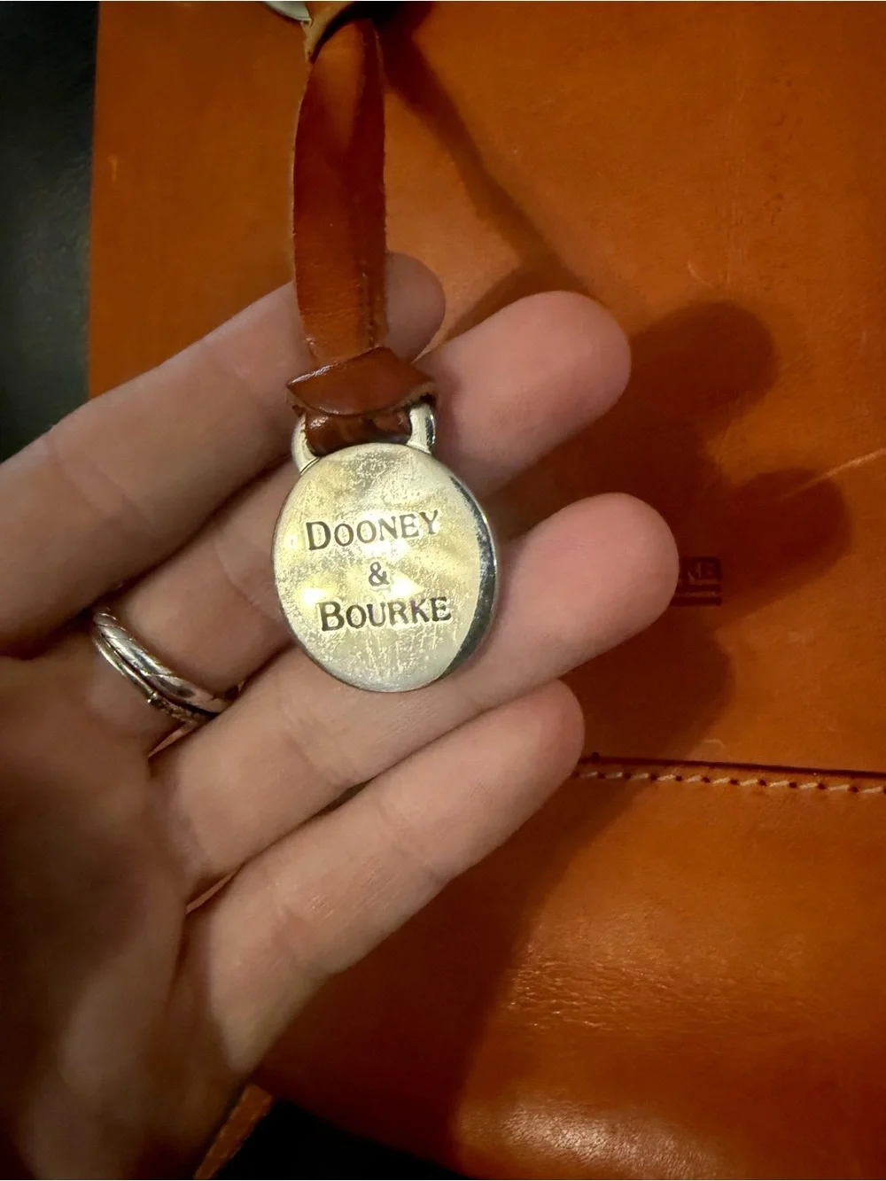 Dooney & Bourke Vintage Brown Leather Sling Backpack Bag